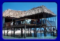 The dining room/ bar over the water, also the entrance for the shore dive.